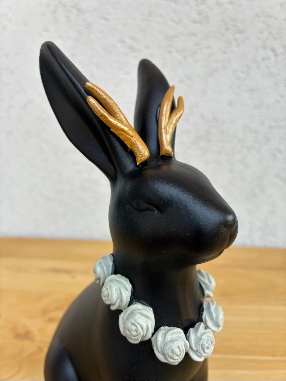 Black ceramic jackalope!  With gold horns snd grey rose necklace!  Bunmy figure